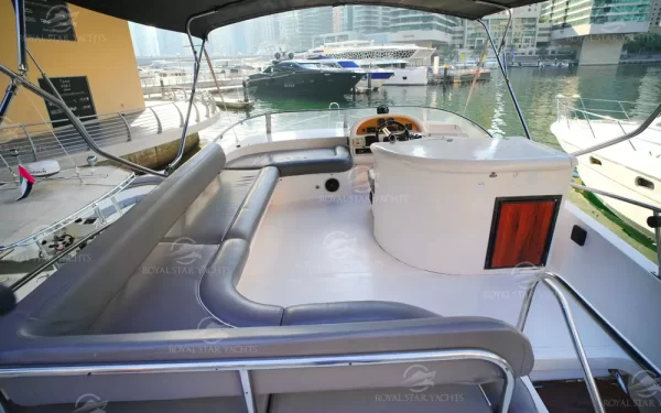Open deck seating area on Al Shali yacht at Dubai Marina