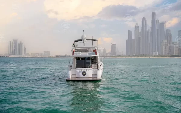 Rear view of 50 FT Al Shali yacht cruising near Dubai skyline