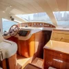 Rear deck seating with Dubai skyline view from Enterprise yacht